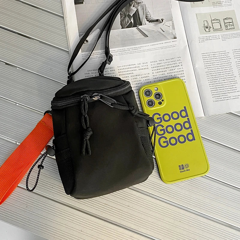 Mini bandolera de nylon con cierre para objetos pequeños