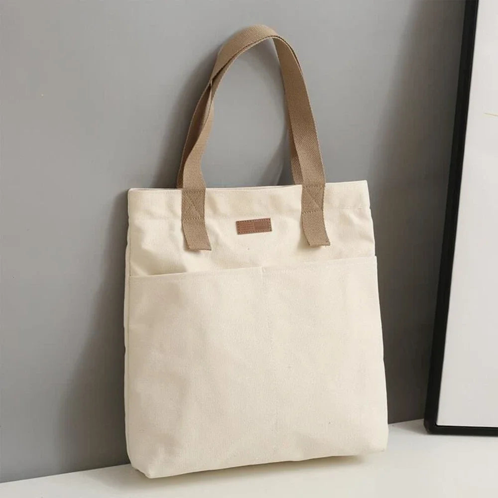 Bolso tote abierto de lona con bolsillo exterior