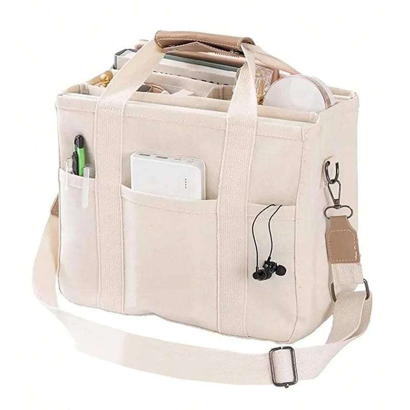 Bolso tote de lona con múltiples bolsillos y correa regulable