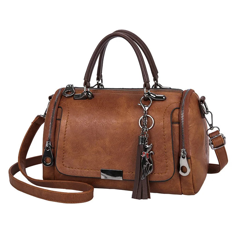 Cartera Boston con borla y correa desmontable