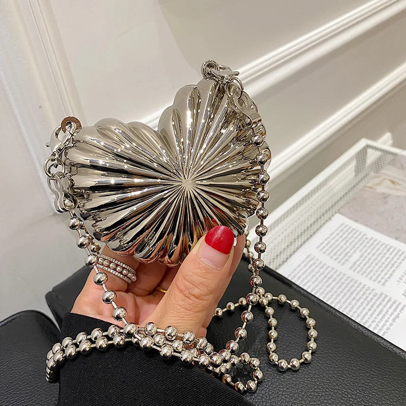 Minaudière metálica mini con cadena cruzada