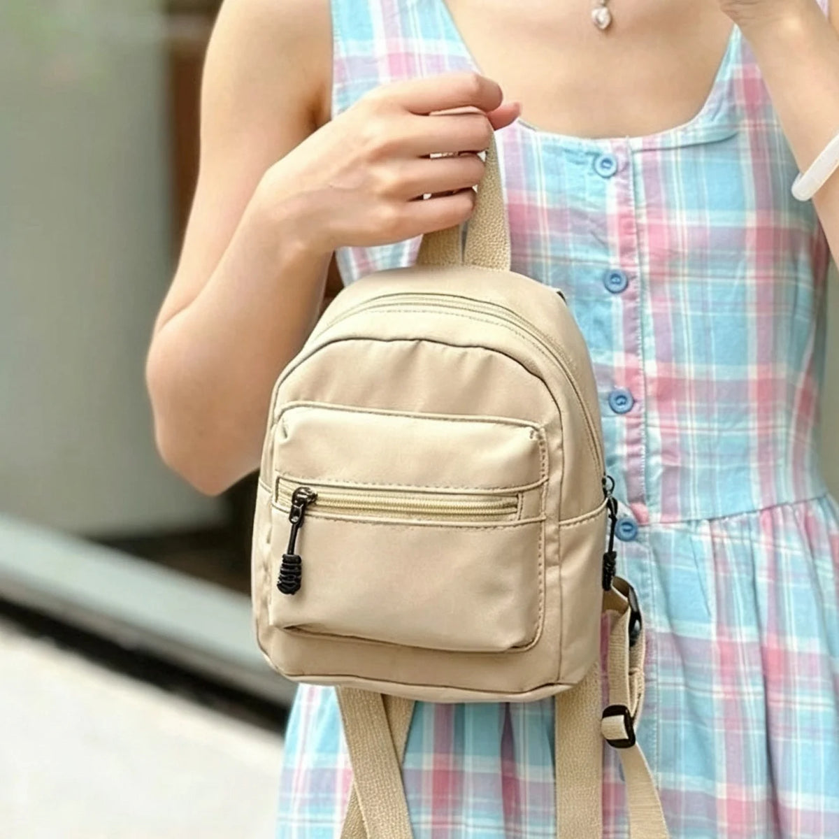Mini mochila de nylon con bolsillo de solapa